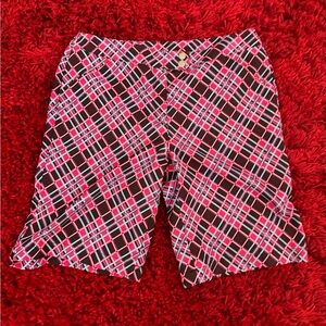 vibrant cyan/pink “grandslam” shorts